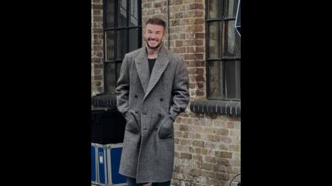 A very precious David Beckham behind the scenes of his Netflix Queue cover shoot